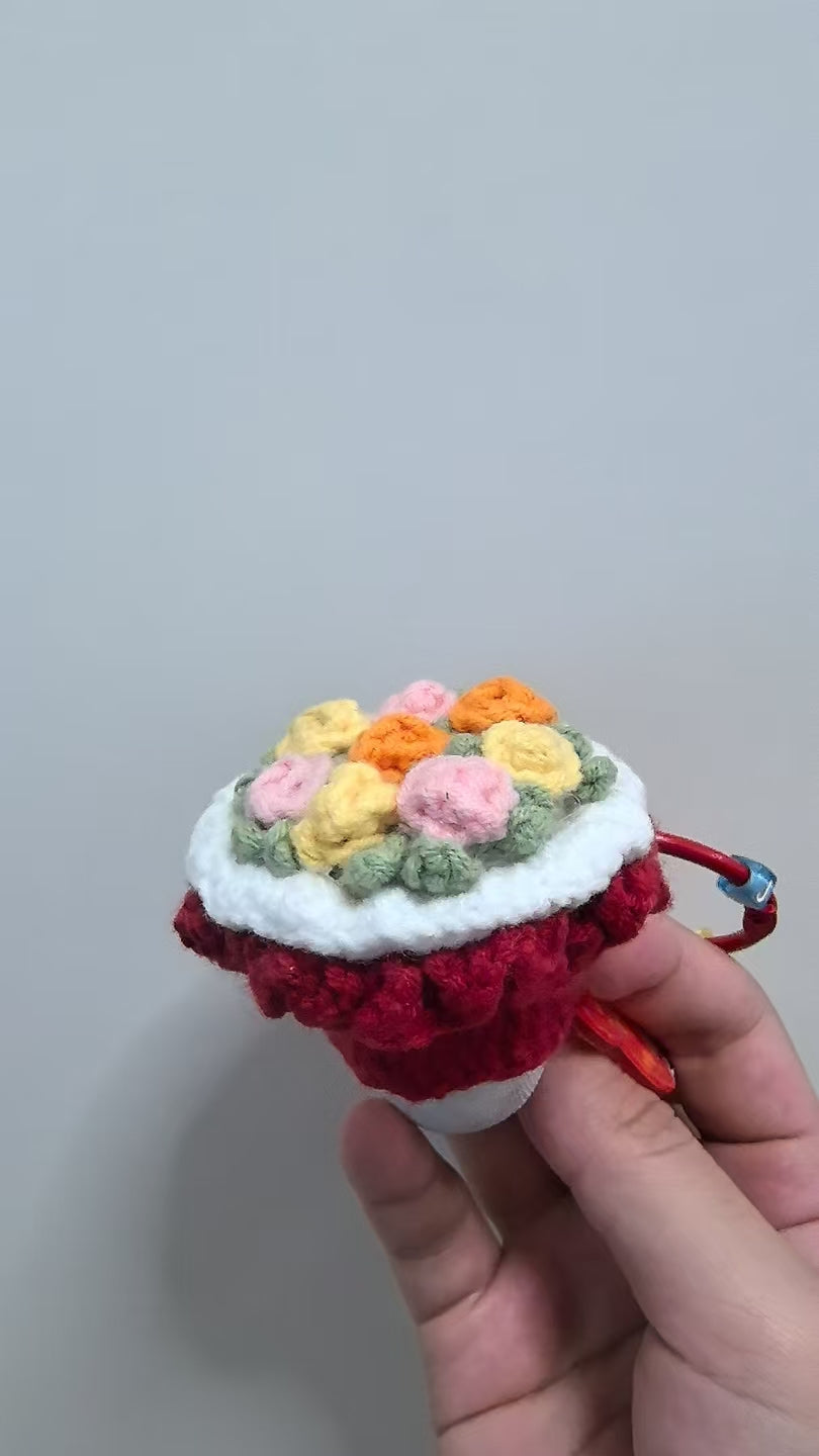 Crocheted pendant - A bouquet of red flowers