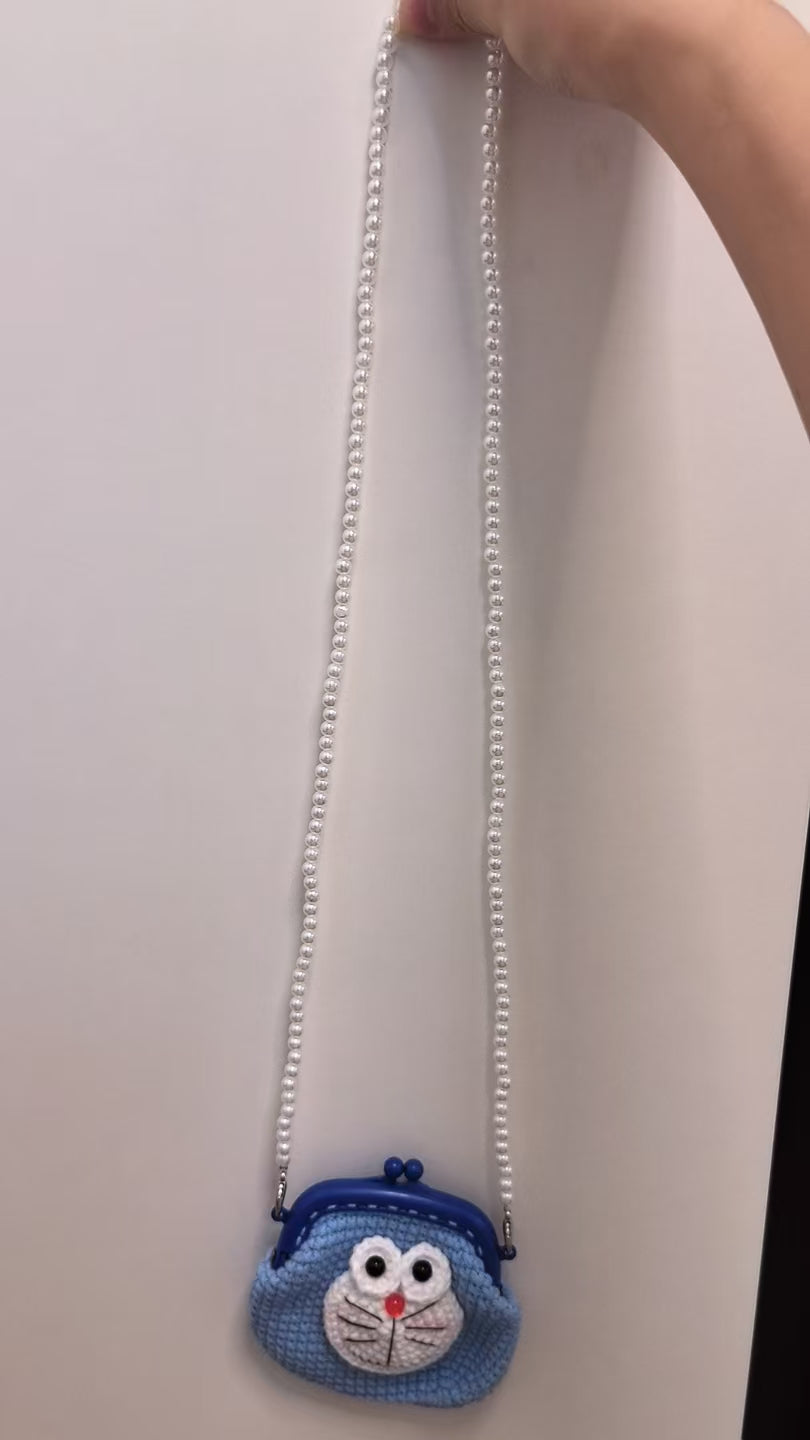 Crocheted card wallet - Doraemon