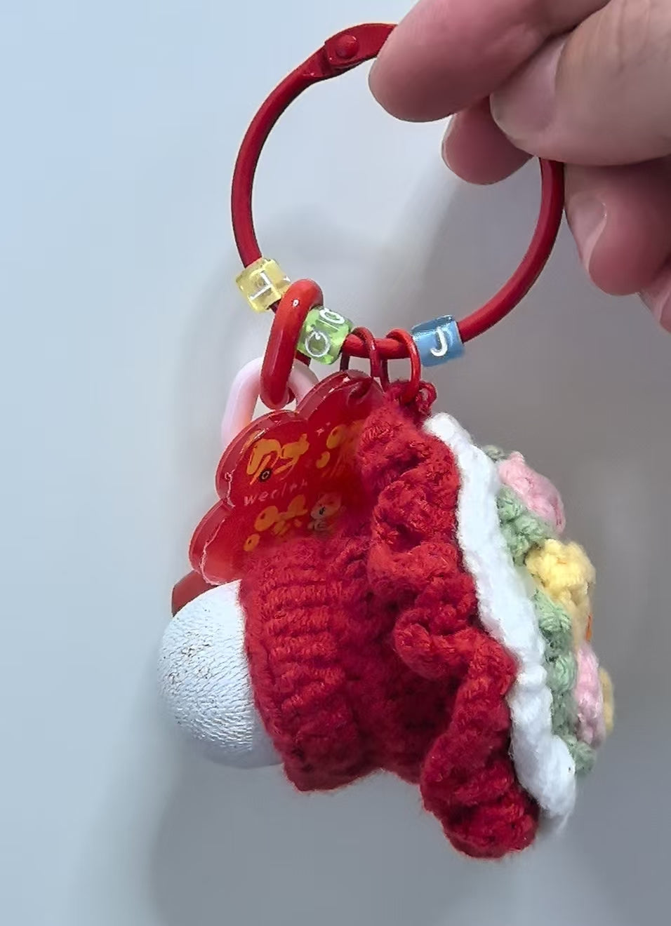 Crocheted pendant - A bouquet of red flowers