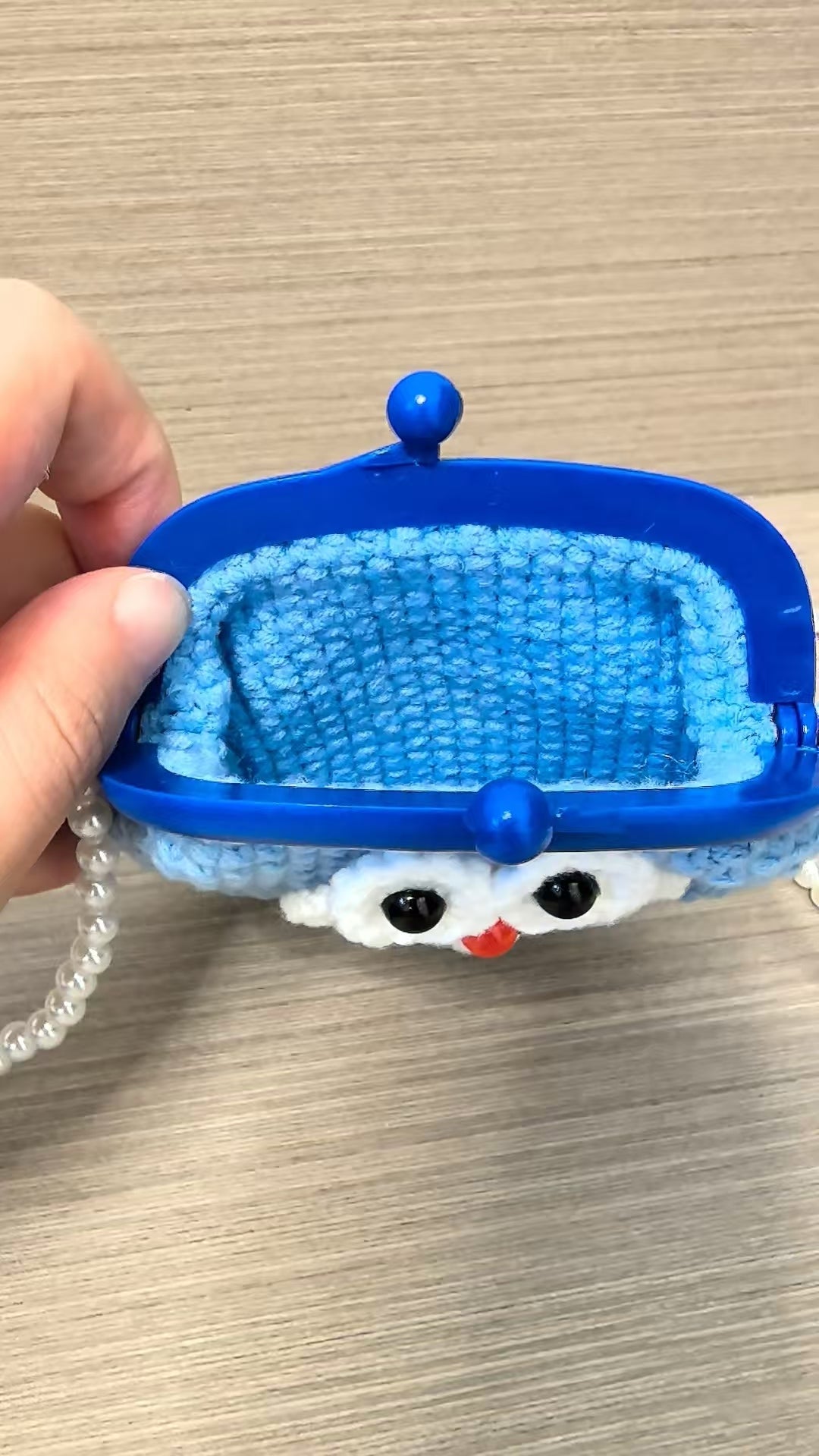 Crocheted card wallet - Doraemon