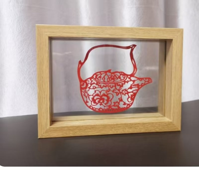 Tea-port paper cutting