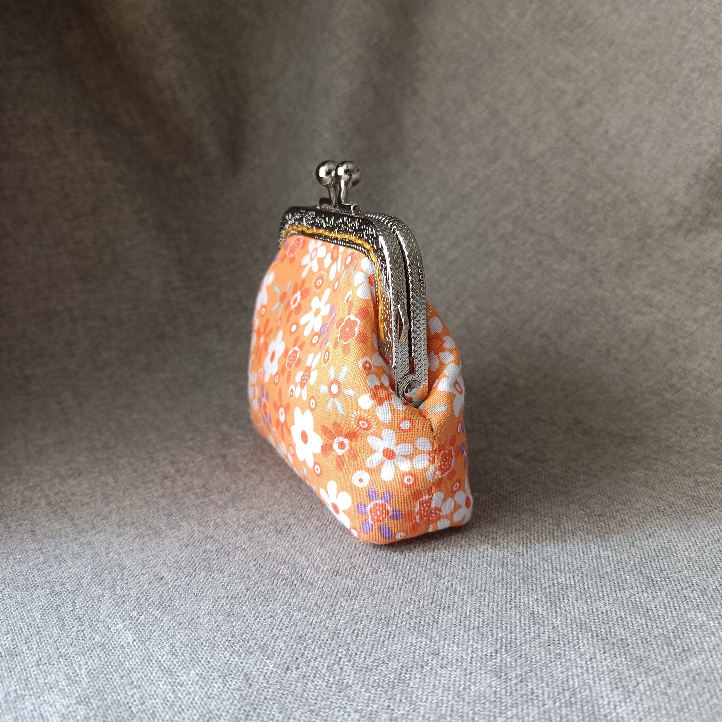 an orange flower card bag