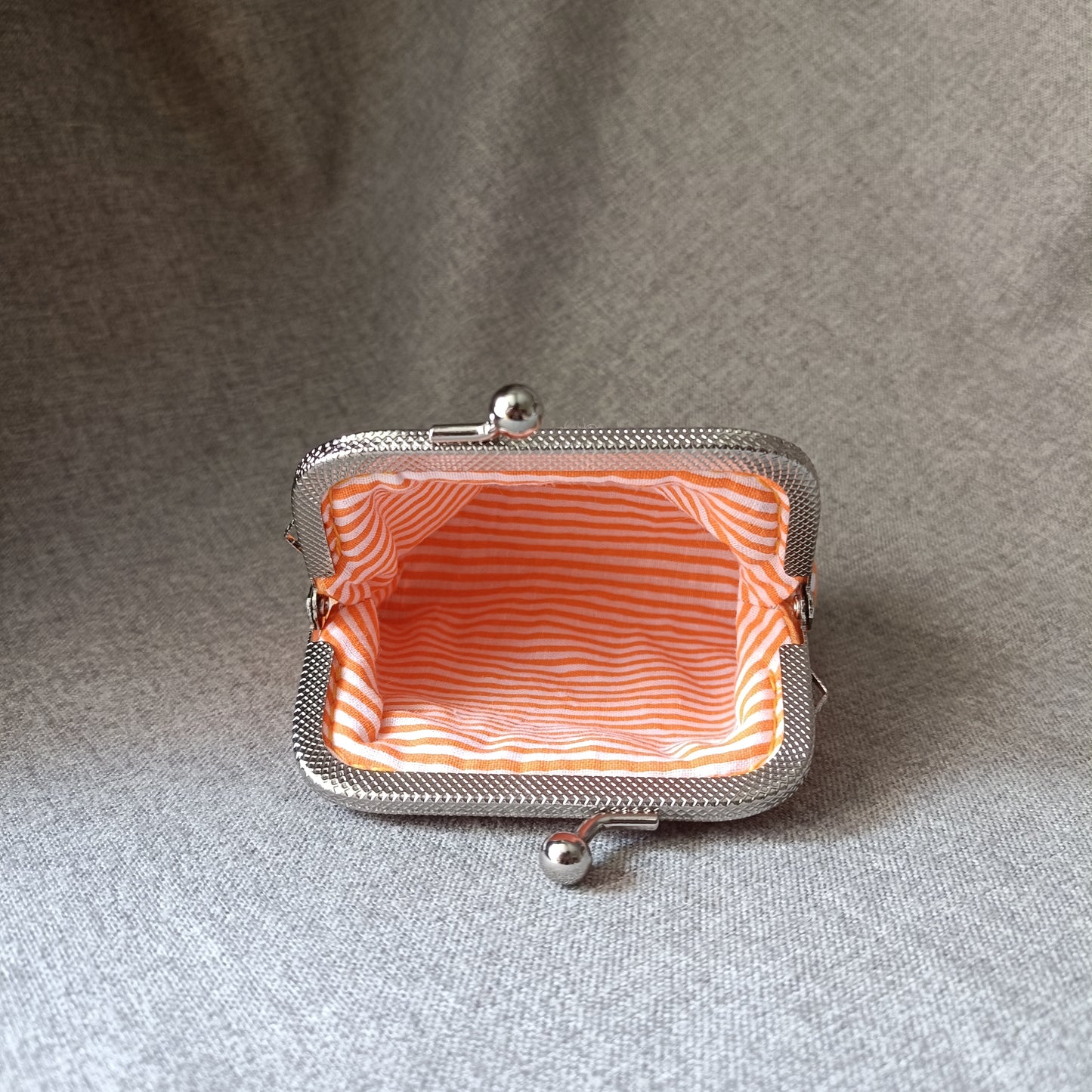 an orange flower card bag